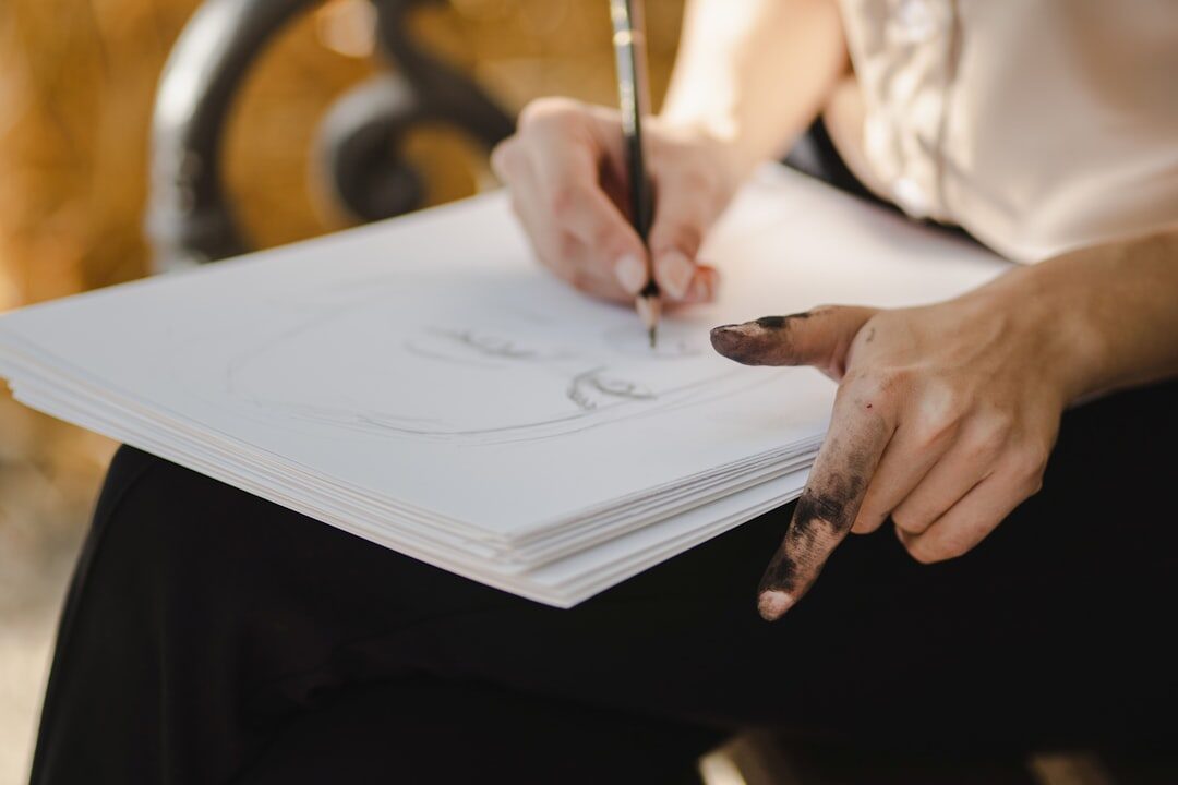 Croatian writer reviewing manuscript pages with a pen in hand