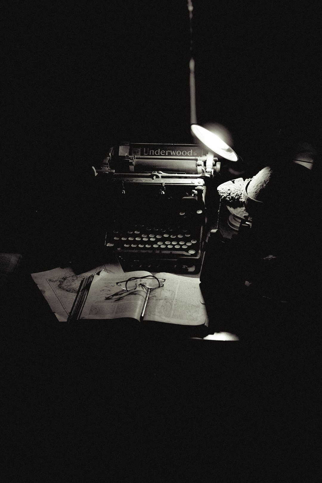 mysterious writer at typewriter
